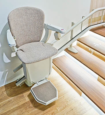 Automatic stair lift on staircase for elderly people Maryland